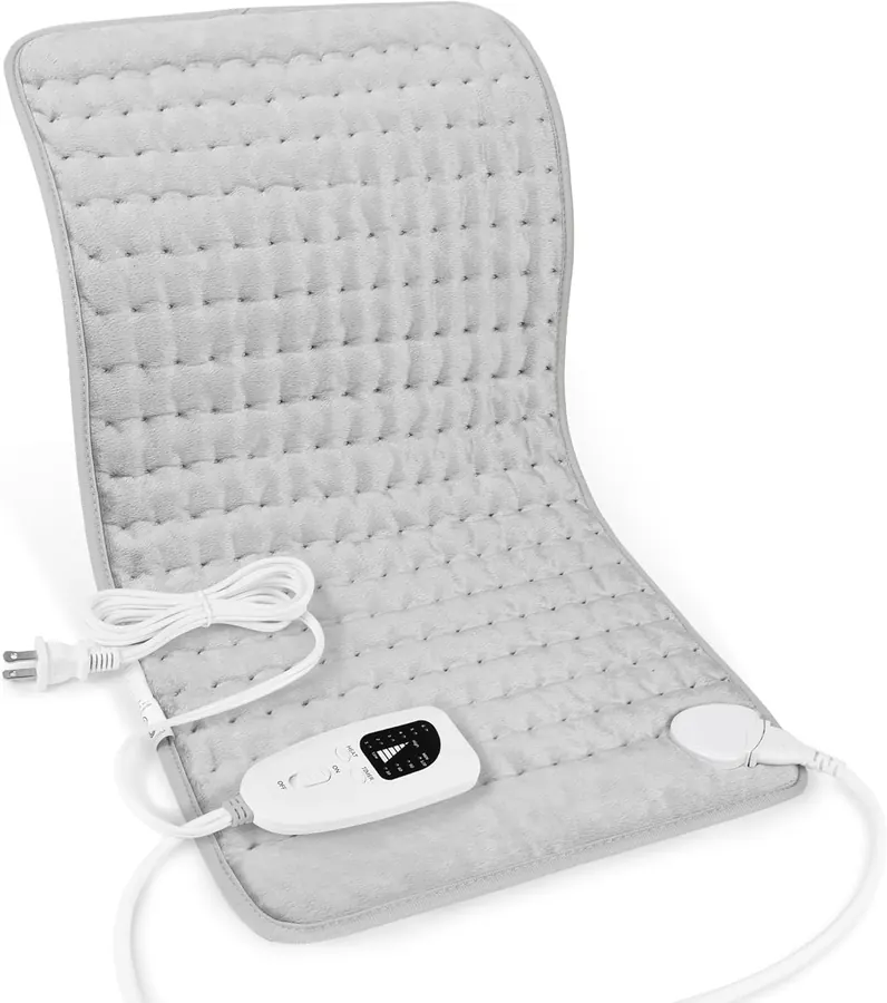 Hand pressing the Deepsoon heating pad control panel showing temperature setting buttons
